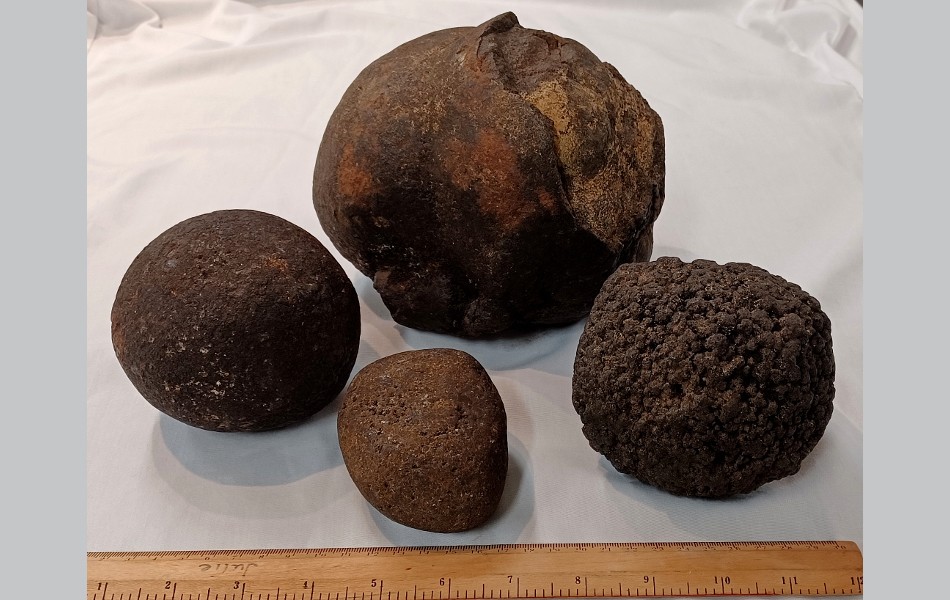 Manganese Nodules. Manganese (Mn) or Polymetallic Nodules are authigenic “rocks” that grow from precipitated metals on the ocean floor. They are formed of concentric layers around a core. We can find micro-nodules in sediment cores and use dredge baskets to gather larger ones. three manganese nodules